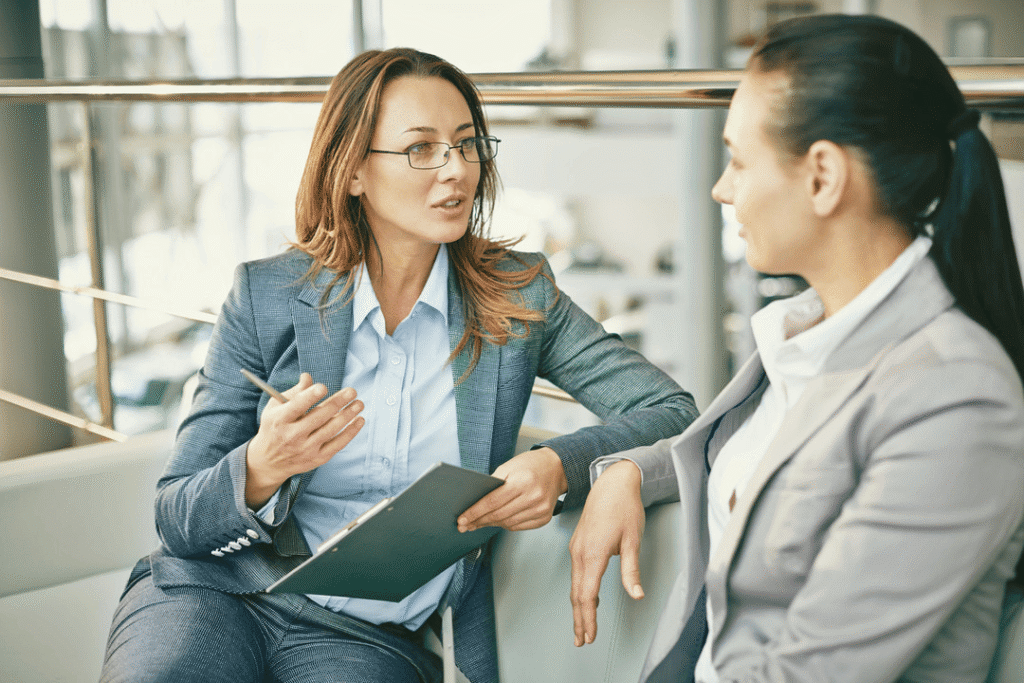 Business owner discussing goals with a coach