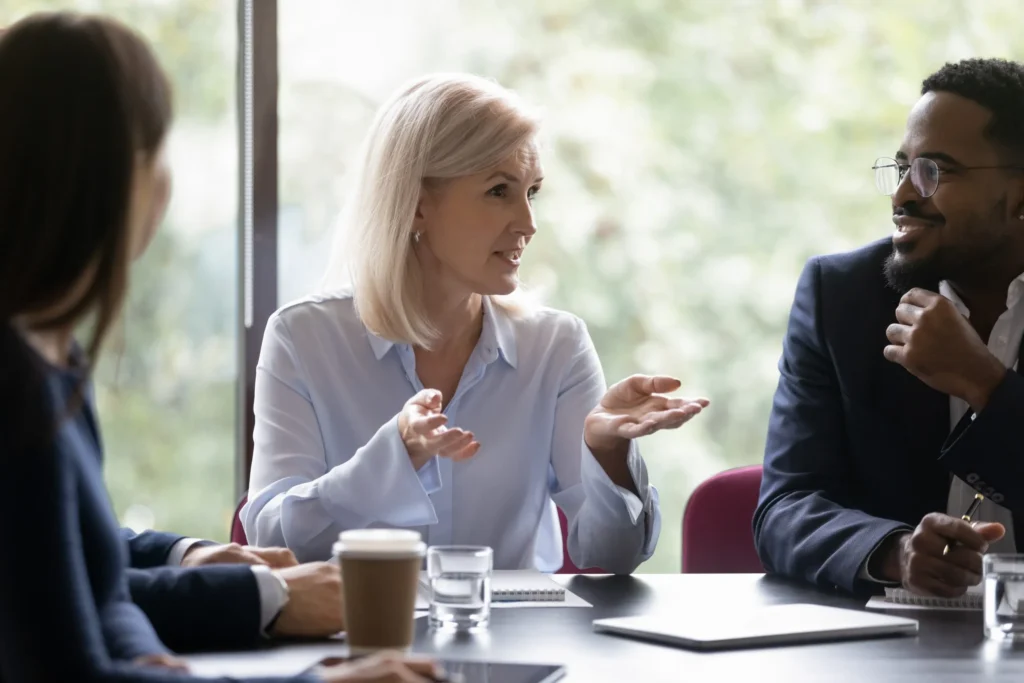 Coach helping a business owner make decisions